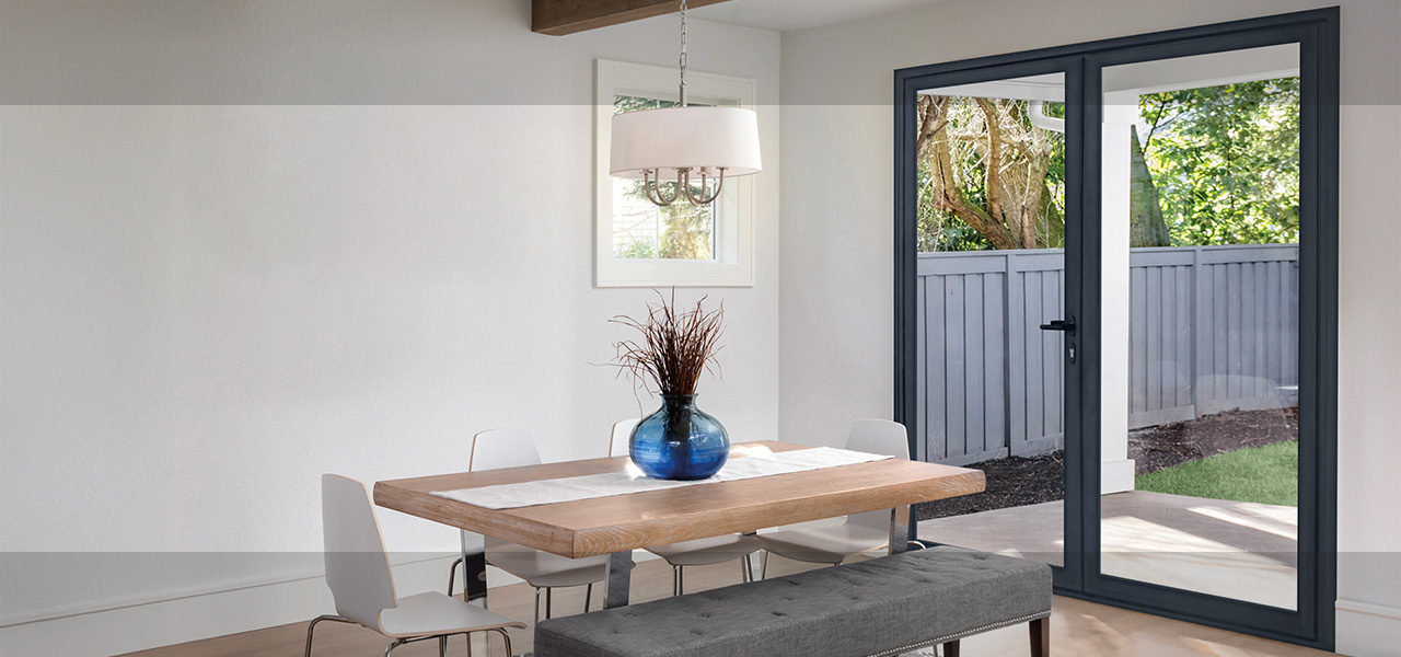 French doors in dining room of modern home